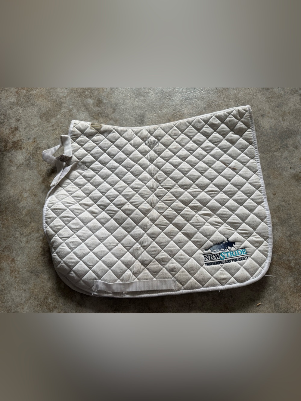 White equestrian saddle pad